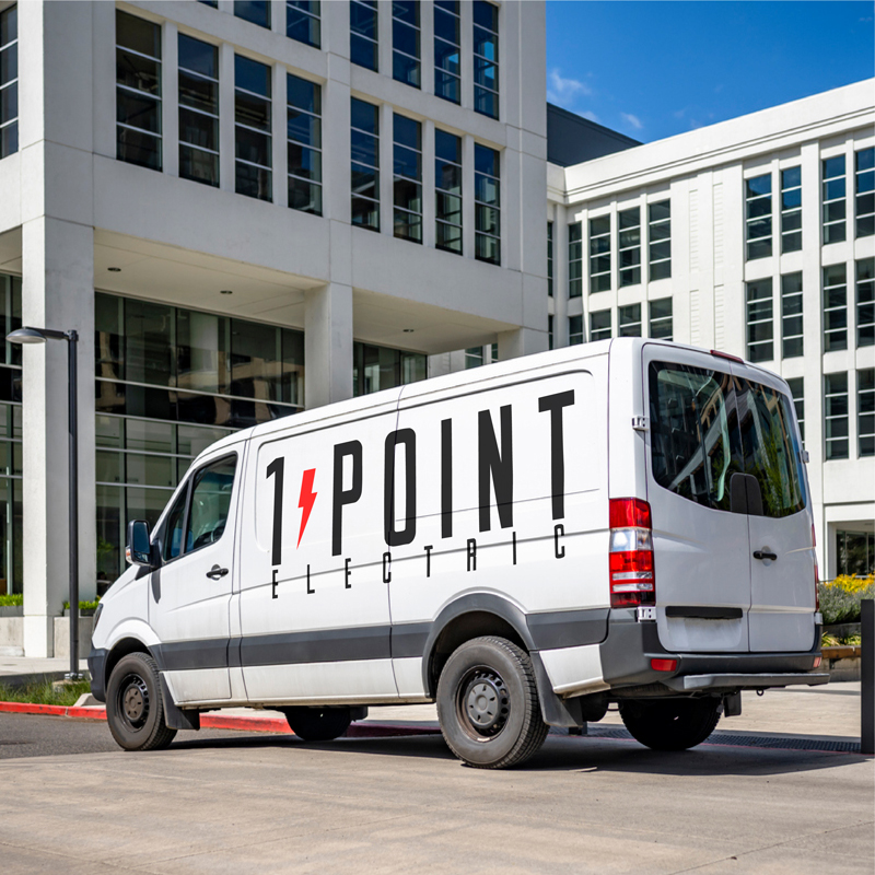 a truck is parked in front of a building